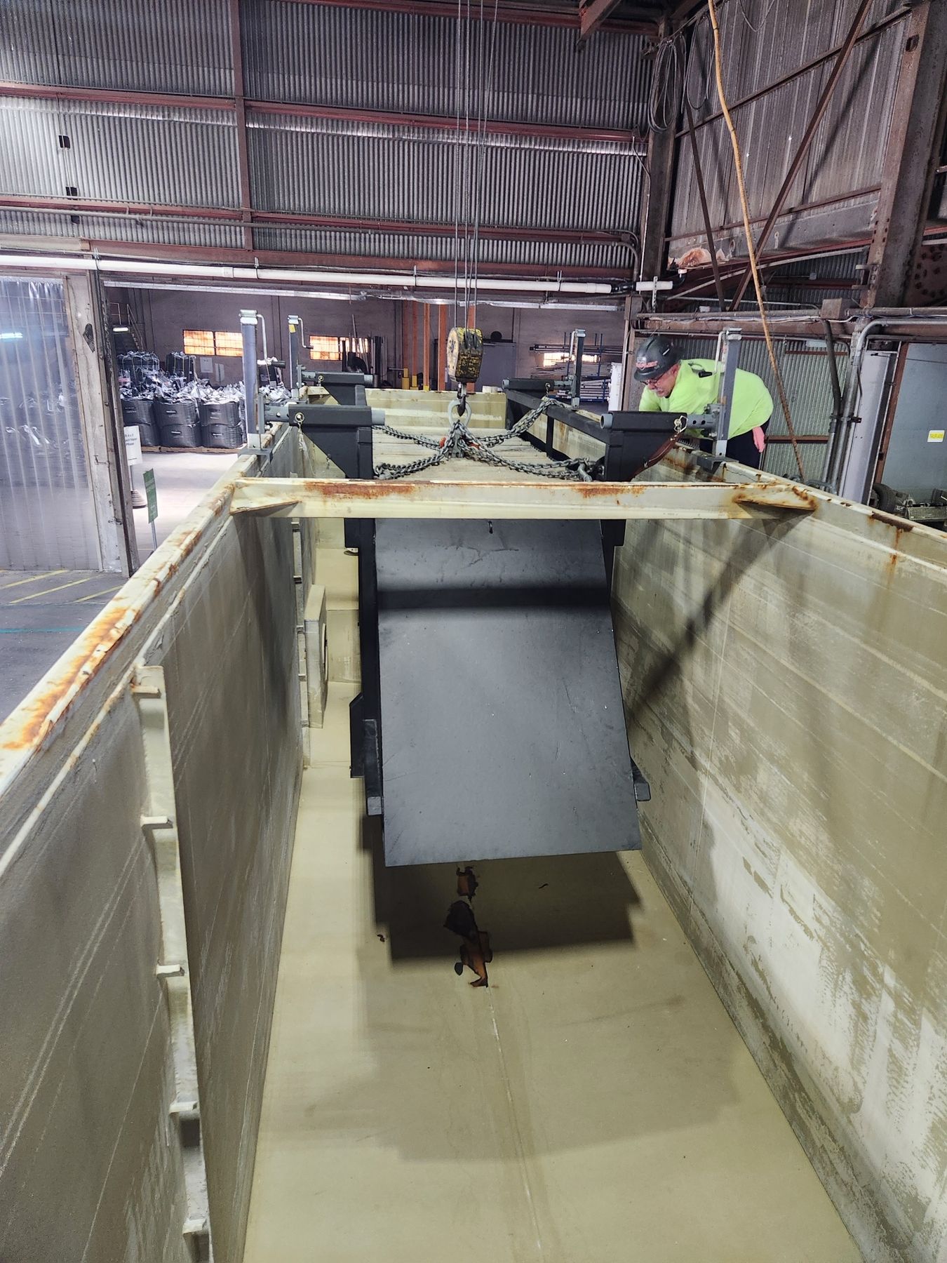 Drop-In clarifier being lowered into a rental tank